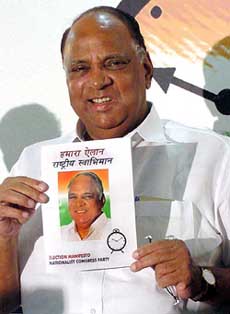 President of the Nationalist Congress Party Sharad Pawar releases his partys election manifesto in New Delhi on Friday.