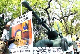 A Congress tableau proclaims Rajiv Gandhis innocence in the Bofors gun scandal outside the AICC office in the Capital 