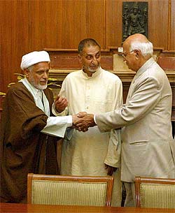 Deputy Prime Minister L. K. Advani shakes hands with Maulana Abbas Ansari