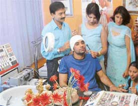 Punjabi pop singer and actor Babbu Mann gets a beauty treatment at Cleopatras newly opened Bride and Groom International Studio in Sector 8