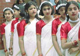 Students of St Marys School wait for their turn to perform at the inauguration of a school building in Sector 46, Chandigarh