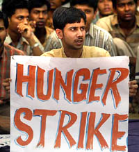A student on hunger strike in front of a museum in Santiniketan on Sunday.  He was among 24 students protesting against Thursdays theft in which the gold Nobel medal awarded to Rabindranath Tagore was stolen.