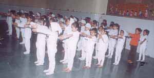 Children of HPS, Kalkaji, taking part in a programme on their sports day