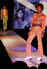 Models walk the ramp during DSYN/2004, a mega fashion show organised by the National Institute of Fashion Technology
