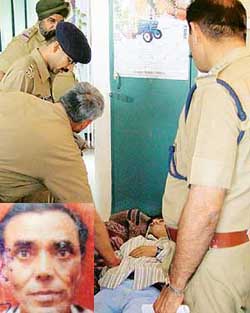 Police officers inspect the body of Kashmiri Ram, who along with his father Phony Ram (inset), apparently committed suicide in a house in the CSIO complex
