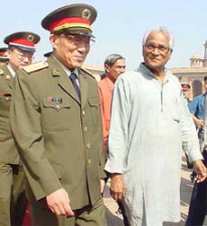 Defence Minister George Fernandes along with his Chinese counterpart Cao Gangchuan arrive for a meeting in New  Delhi