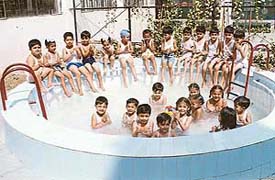 Bal Niketan children enjoy a splash in the schools pool