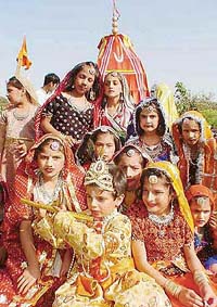 Children dressed as Lord Krishna and gopis participate in a rath yatra organised by Sri Chaitanya Gaudiya Math, Sector 20-B, in Chandigarh on Wednesday.