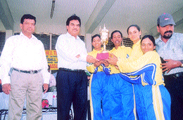 The Goa womens team, who won the National Baseball Championship, with Jagdish Mittal and organising secretary P. C. Bharadwaj at the University ground.