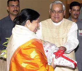 Prime Minister Atal Bihari Vajpayee welcomes melody queen Lata Mangeshkar during the release of music album Antar-Naad comprising poems of Mr Vajpayee sung by her in New Delhi 