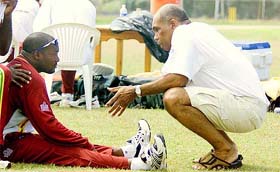 Tony Howard, the newly appointed manager of the West Indies cricket team, speaks with West Indies captain Brian Lara
