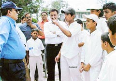 A player from St Johns School raises objection on an average player of the rival team in the first semi-finals of the SN Vohra Memorial Cricket Tournament played here on @@Thursday at the Cricket Stadium