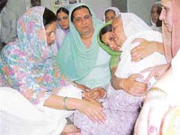 Joginder Kaur, widow of Gurcharan Singh Tohra, is consoled by Ms Preneet Kaur and family members of the late SGPC President in Patiala