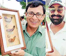P.K. Chaudhry (left) and Dilmick Lamba after receiving the prizes at the Chandigarh Golf Club on Saturday.