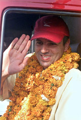 National Conference President Omar Abdullah greets supporters