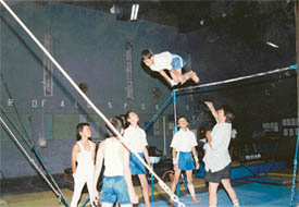 Trainees practise on the horizontal bar at the Gymnastics Coaching Centre