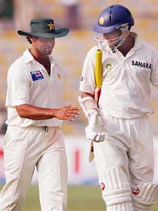 Shoaib Akhtar congratulates Yuvraj Singh after the latter scored his maiden Test century 