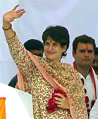 Priyanka Vadra waves to the crowd during an election campaign rally 