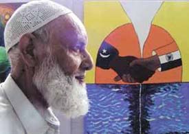 A visitor admiring one of the paintings on India-Pakistan thaw in ties at the painting exhibition on India Shining, organised by the BJP cultural cell at BJP headquarters in the Capital on Tuesday.