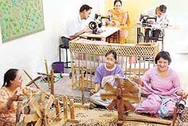 Mentally challenged children learn weaving at Karuna Sadan, Sector 11, Chandigarh, on Thursday. 