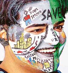 A participant during the "paint your face" competition at the annual function of the University Institute of Engineering and Technology, Panjab University