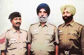 Head Constable Om Prakash, driver of a PCR vehicle Kulwant Singh and Home Guards volunteer Satnam Singh, who caught an auto lifter in Sector 15, Chandigarh