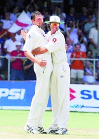 Harmison exults with skipper Vaughan.