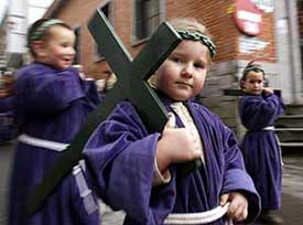 Boys penitents march in a procession during Easter in Segura, northern Spain, on Thursday.