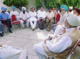 A former MP, Mr Gurcharan Singh Galib, along with his supporters at his residence