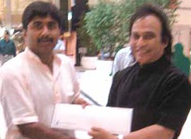 DDCA vice-president Suresh K Chopra meeting Javed Miandad in Lahore.