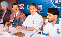 Test cricketer Harbhajan Singh (extreme right) speaks at a press conference for the promotion of a musical talent hunt contest in Chandigarh on Monday.