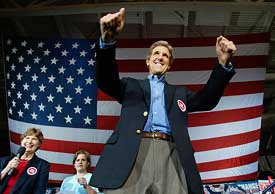 US presidential candidate John Kerry reacts to the cheers of the crowd 