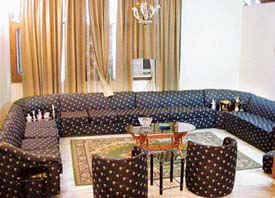 The drawing room, though in the semi basement has enough natural light and air circulation through ventilators.