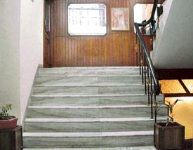 Double width staircase, on each split level create an element of space.