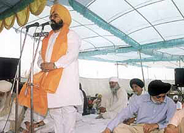 On the occasion of the 305th Khalsa Srijana Divas on Baisakhi, Mr P. S. Bawa, member of the Delhi Minority Commission, is being felicitated at Gurdwara Majnu Ka Tilla by DSGMC president Prahlad Singh Chandok. 