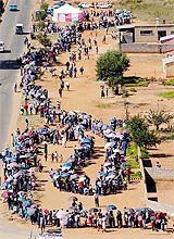 Residents of Soweto queue up to cast their votes in South Africa's third democratic elections on Wednesday