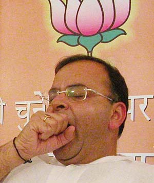 Union Minister for Law and Justice Arun Jaitely yawns during the press conference of Delhi Sadar Lok Sabha constituency candidate Vijay Goel