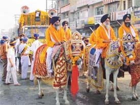 Devotees take out a nagar kirtan procession to celebrate the 500th birth anniversary of Guru Angad Dev in Ludhiana