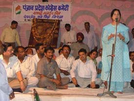 Dr Amrit Kaur, mother of Manish Tewari, the Congress candidate, addresses a rally