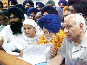 Mr Charanjit Singh Atwal, SAD-BJP candidate from the Phillaur Lok Sabha seat, files his nomination papers in the office of Mr Ashok Gupta, District Returning Officer, at Jalandhar on Monday, along with Bibi Jagir Kaur and former minister Balramji Dass Tandon.