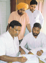 HVP candidate Aman Kumar files nomination papers in Ambala on Wednesday.