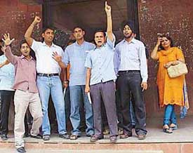 Law students protest in front of the Law Department to press for a change in the semester examination datesheet in Panjab University, Chandigarh