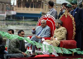 Chief Minister, Mufti Mohammad Sayeed with Finance Minister Muzaffar Hussain Beigh during election campaign in Dal Lake
