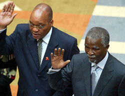 President Thabo Mbeki and his Deputy President Jacob Zuma (L) are sworn in as South Africa's third democratic Parliament convenes in Cape Town