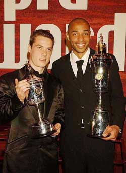 Aresenals Thierry Henry with his PFA Players Player of the Year award, and Scott Parker with his Young Player of the Year award, at Londons Grosvenor House Hotel