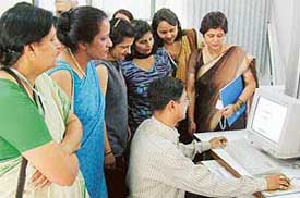 A delegate at Principals Conference organised by Intel and Koshish Master Trainers Club interacts with teachers of DAV Public School, Sector 8, Chandigarh