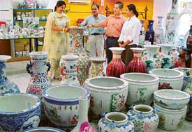 Exquisitely crafted vases and artifacts on display at an exhibition in Chandigarh