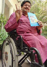 Mr Javed Abidi, an Independent candidate from the New Delhi constituency and chairman of the  Disabled Rights Group, releases his manifesto at a press conference in New Delhi on Tuesday.