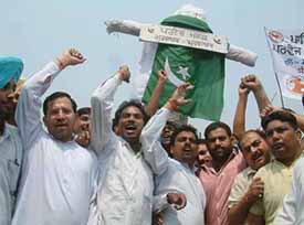 Youth Congress activists burn the effigy of Pakistan President Pervez Musharraf in Amritsar on Tuesday.
