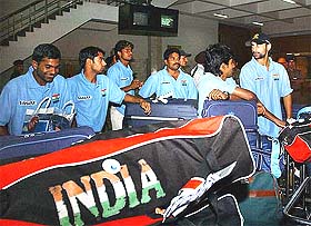 Indian hockey team members arrive at the IGI airport in New Delhi 